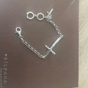 Silpada cross Silver Bracelet. 8 inch adjustable